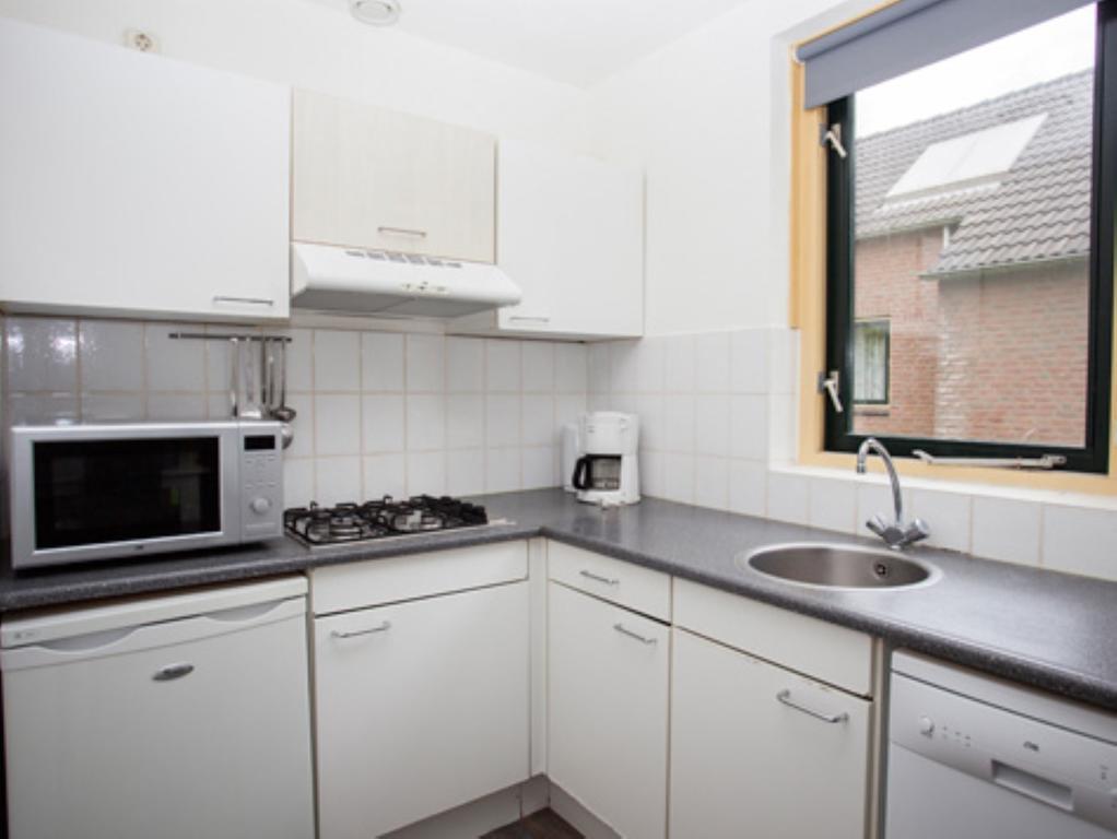 Vakantiepark De Groene Heuvels Ewijk Екстериор снимка